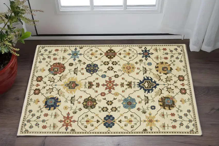 Ivory And Gold Oriental Area Rug With Fringe Photo 1