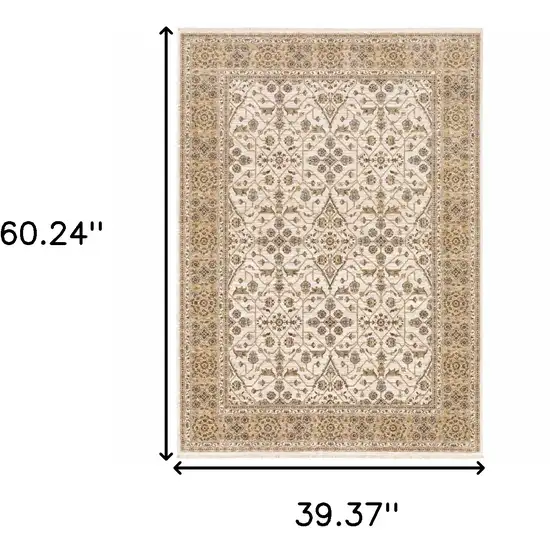 Ivory And Gold Oriental Power Loom Stain Resistant Area Rug With Fringe Photo 3