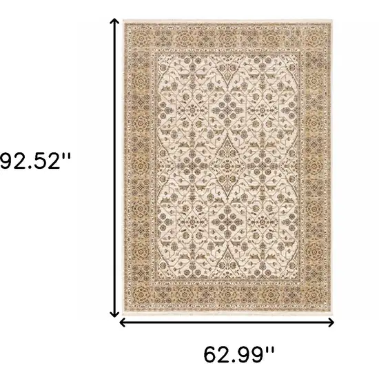 Ivory And Gold Oriental Power Loom Stain Resistant Area Rug With Fringe Photo 3