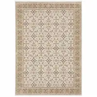Photo of Ivory And Gold Oriental Power Loom Stain Resistant Area Rug With Fringe