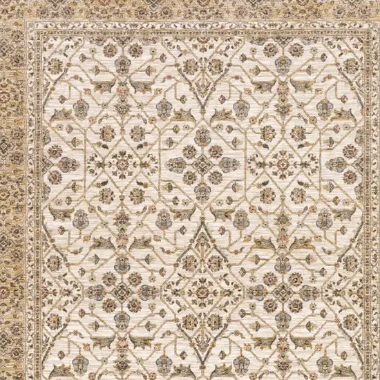 Ivory And Gold Oriental Power Loom Stain Resistant Area Rug With Fringe Photo 3