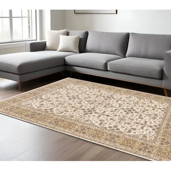 Ivory And Gold Oriental Power Loom Stain Resistant Area Rug With Fringe Photo 2