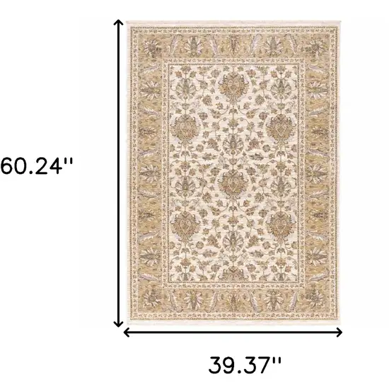 Ivory And Gold Oriental Area Rug With Fringe Photo 3