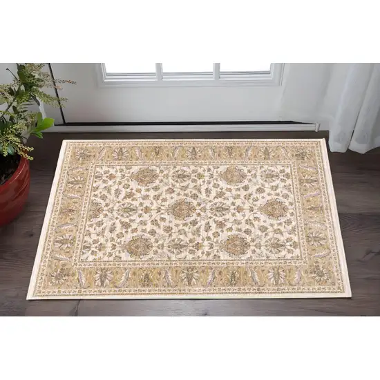 Ivory And Gold Oriental Area Rug With Fringe Photo 1