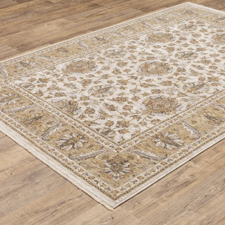 Ivory And Gold Oriental Power Loom Stain Resistant Area Rug With Fringe Photo 5