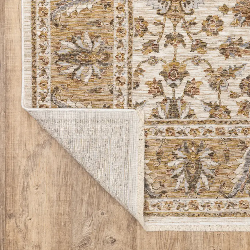 Ivory And Gold Oriental Power Loom Stain Resistant Area Rug With Fringe Photo 8