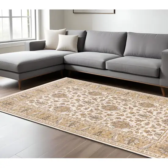 Ivory And Gold Oriental Area Rug With Fringe Photo 1