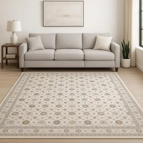 Ivory And Gold Oriental Power Loom Stain Resistant Area Rug With Fringe Photo 1
