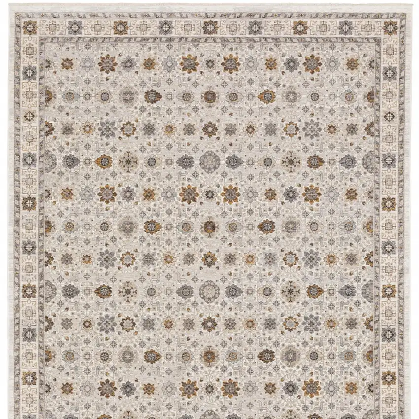 Ivory And Gold Oriental Power Loom Stain Resistant Area Rug With Fringe Photo 7