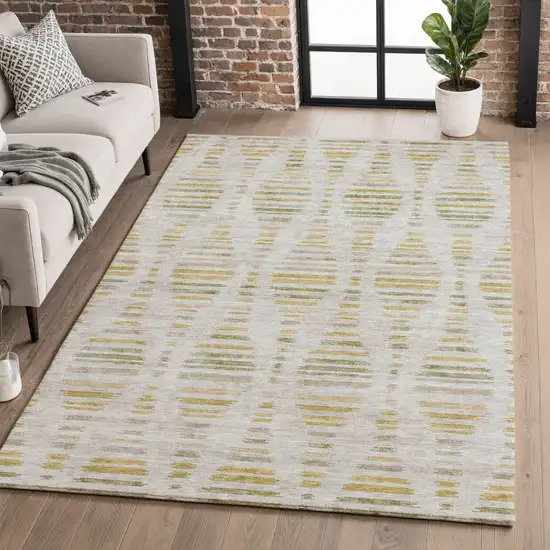 Ivory And Gold Striped Washable Area Rug With UV Protection Photo 4