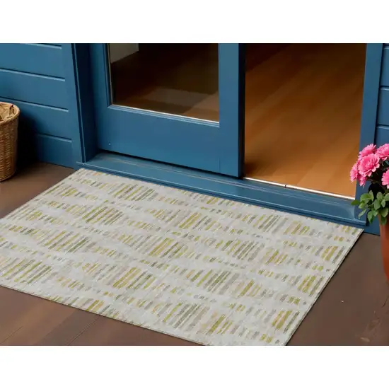 Ivory And Gold Striped Washable Indoor Outdoor Area Rug Photo 2