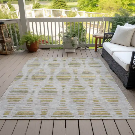 Ivory And Gold Striped Washable Indoor Outdoor Area Rug Photo 9