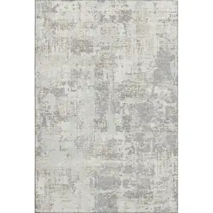 Photo of Ivory And Gray Abstract Washable Area Rug With UV Protection