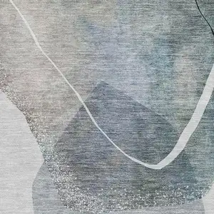 Photo of Ivory And Gray Abstract Washable Area Rug With UV Protection