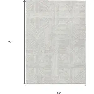 Photo of Ivory And Gray Abstract Washable Indoor Outdoor Area Rug