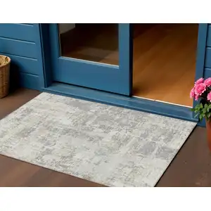 Photo of Ivory And Gray Abstract Washable Indoor Outdoor Area Rug