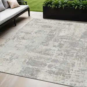 Photo of Ivory And Gray Abstract Washable Indoor Outdoor Area Rug