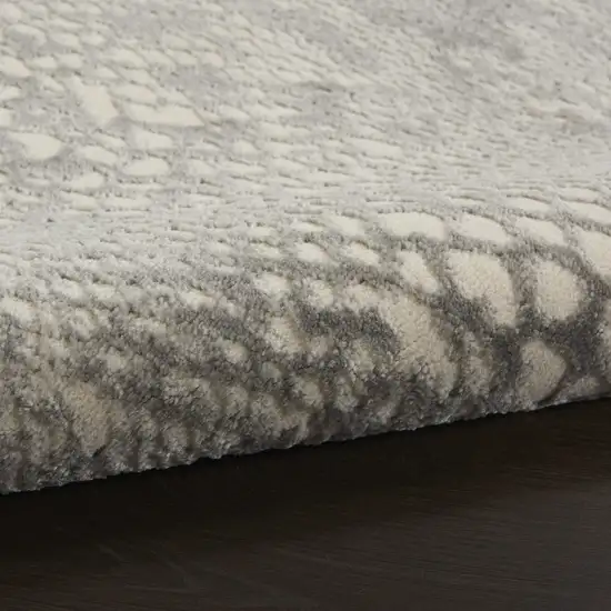 Ivory And Gray Animal Print Distressed Area Rug Photo 9