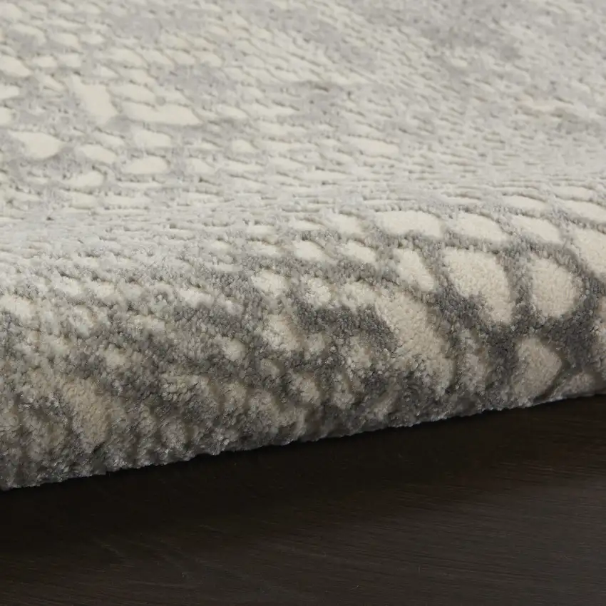 Ivory And Gray Animal Print Distressed Area Rug Photo 9