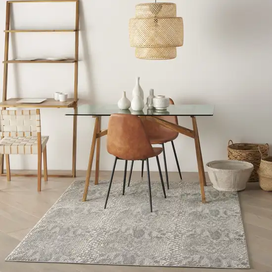 Ivory And Gray Animal Print Distressed Area Rug Photo 5