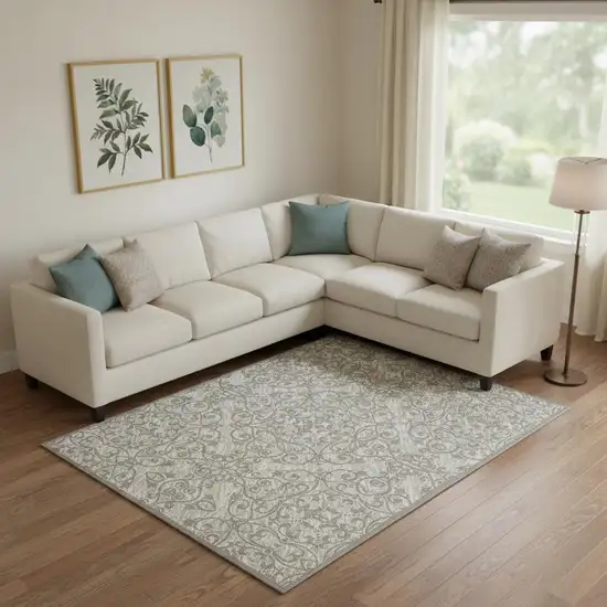 Ivory And Gray Damask Distressed Area Rug Photo 1