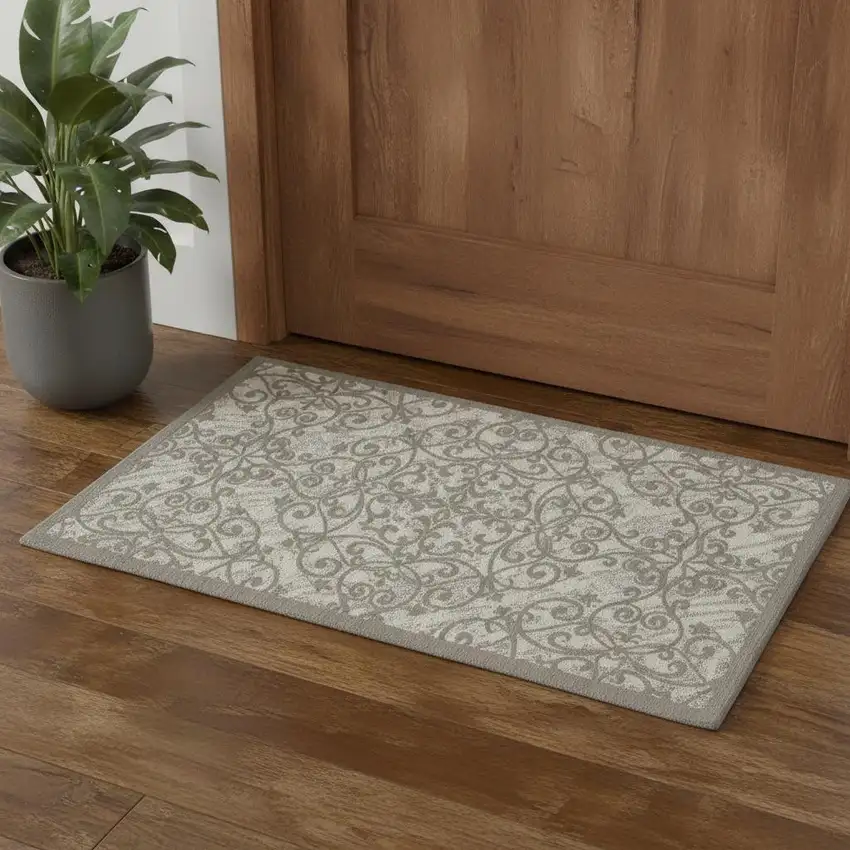 Ivory And Gray Damask Distressed Area Rug Photo 1