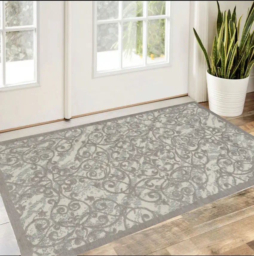 Ivory And Gray Damask Distressed Area Rug Photo 1