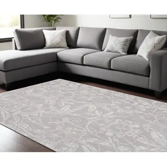 Ivory And Gray Floral Distressed Area Rug Photo 1