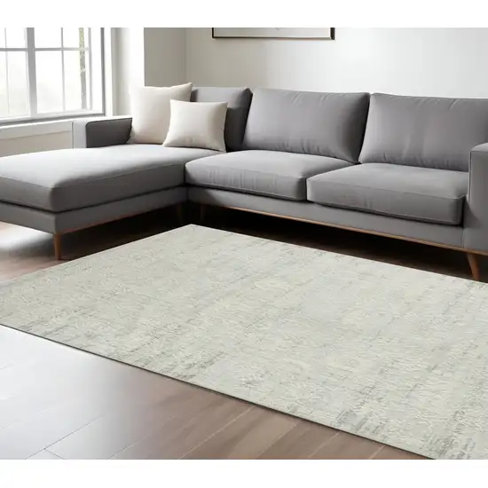Ivory And Gray Floral Distressed Area Rug Photo 1