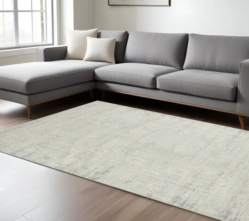 Ivory And Gray Floral Distressed Area Rug Photo 1