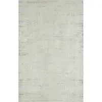 Photo of Ivory And Gray Floral Power Loom Distressed Stain Resistant Area Rug