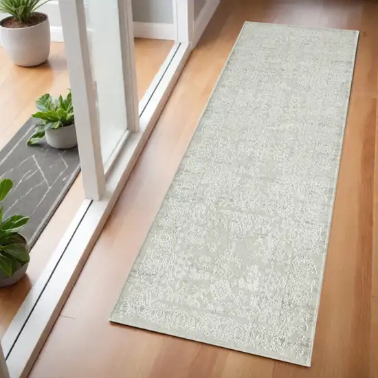 2' X 6' Ivory And Gray Floral Stain Resistant Area Rug Photo 1