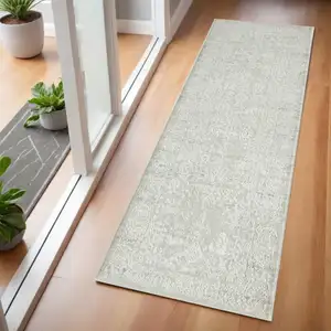 Photo of Ivory And Gray Floral Stain Resistant Area Rug