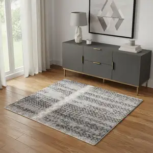 Photo of Ivory And Gray Geometric Area Rug