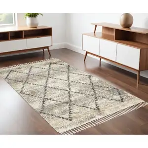 Photo of Ivory And Gray Geometric Shag Non Skid Area Rug With Fringe