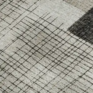 Photo of Ivory And Gray Geometric Washable Area Rug With UV Protection
