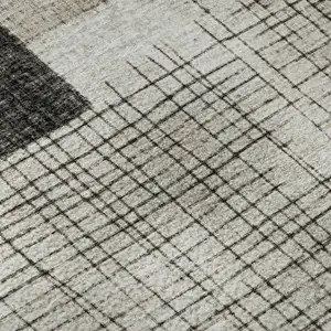 Photo of Ivory And Gray Geometric Washable Area Rug With UV Protection