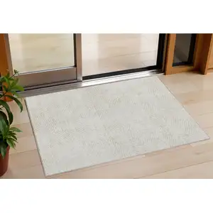 Photo of Ivory And Gray Geometric Washable Indoor Outdoor Area Rug