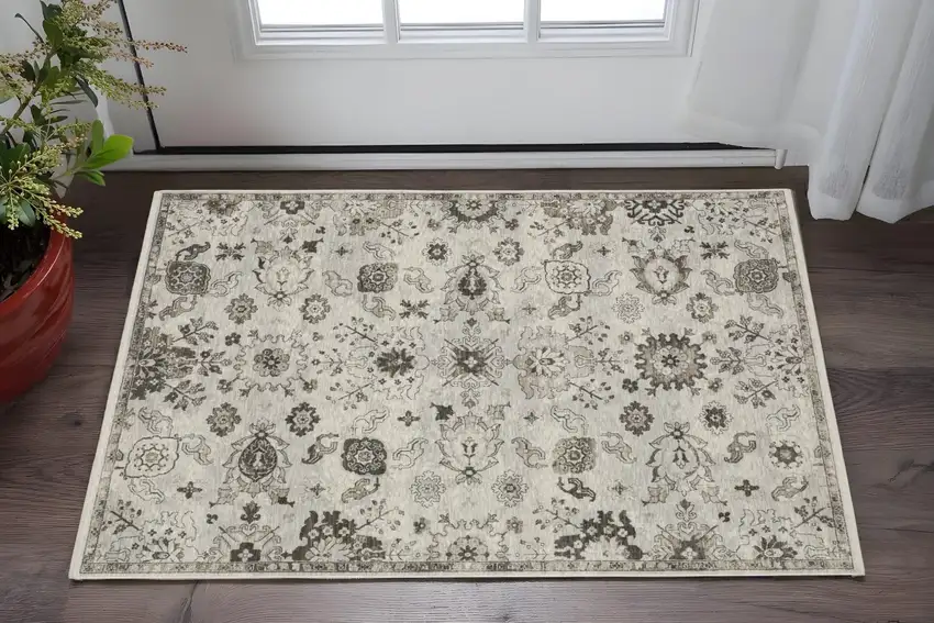 Ivory And Gray Oriental Area Rug With Fringe Photo 1