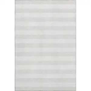 Photo of Ivory And Gray Striped Washable Area Rug With UV Protection