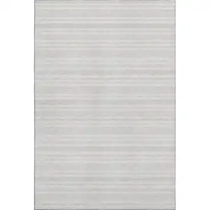 Photo of Ivory And Gray Striped Washable Area Rug With UV Protection