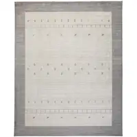 Photo of Ivory And Gray Wool Hand Knotted Stain Resistant Area Rug