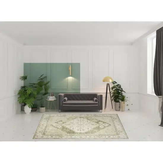 Ivory And Green Floral Distressed Area Rug Photo 1