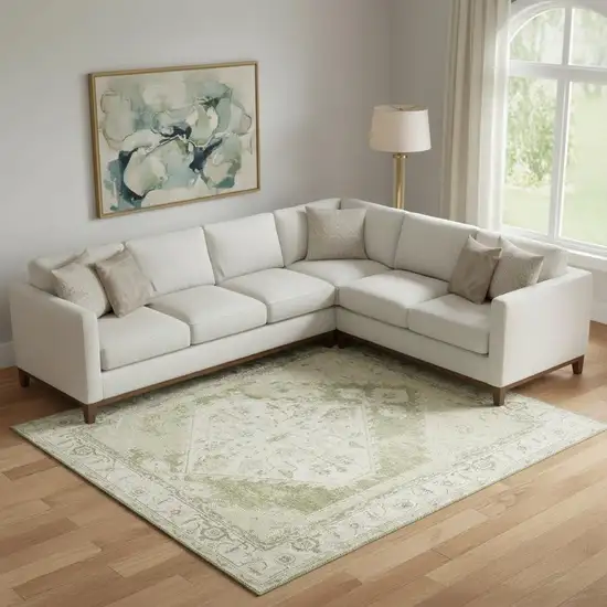 Ivory And Green Floral Distressed Area Rug Photo 1