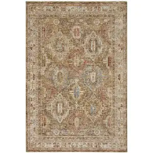 Photo of Ivory And Green Geometric Distressed Area Rug