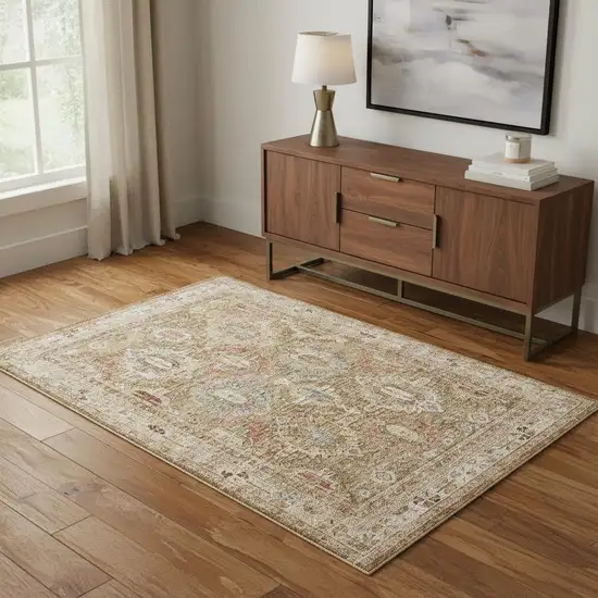 Ivory And Green Geometric Distressed Area Rug Photo 1