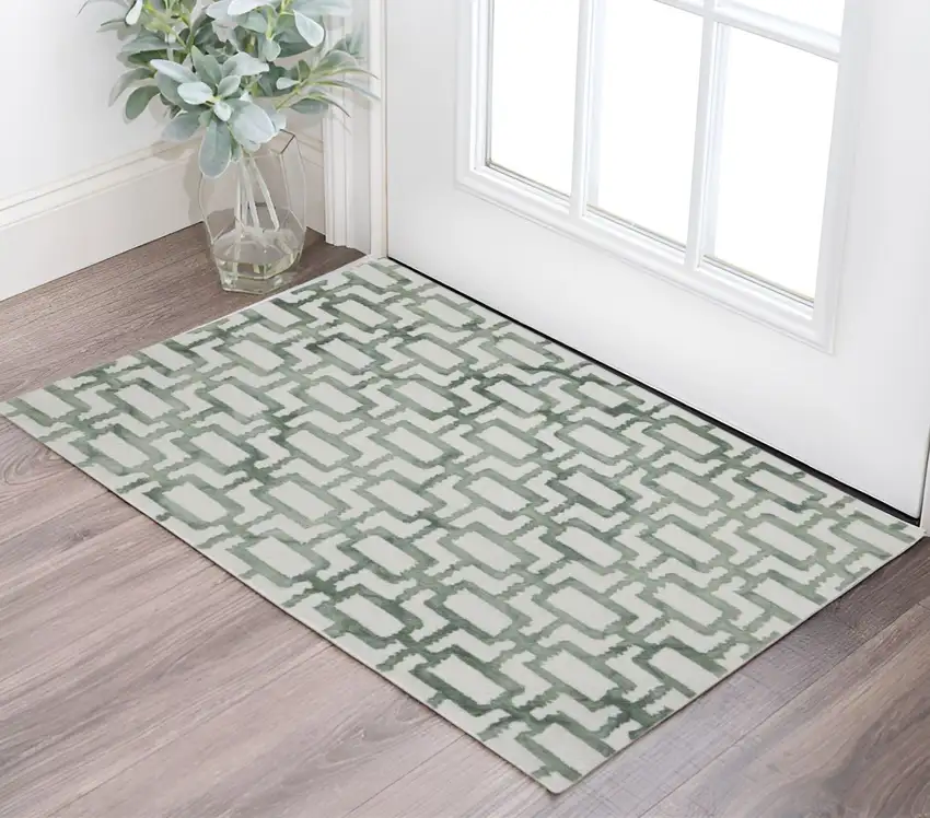 Ivory And Green Wool Geometric Tufted Handmade Area Rug Photo 1