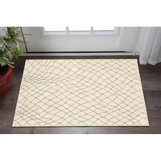 Ivory And Grey Geometric Power Loom Stain Resistant Area Rug Photo 1