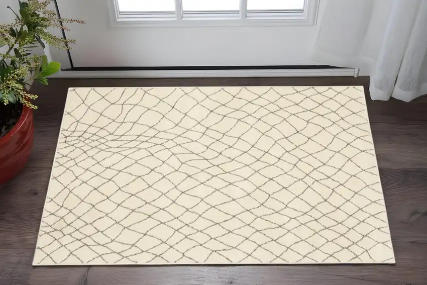 Ivory And Grey Geometric Power Loom Stain Resistant Area Rug Photo 1