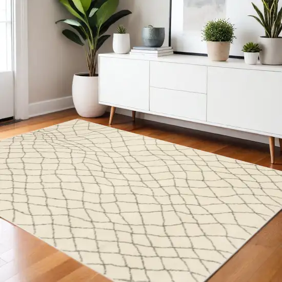 Ivory And Grey Geometric Power Loom Stain Resistant Area Rug Photo 1